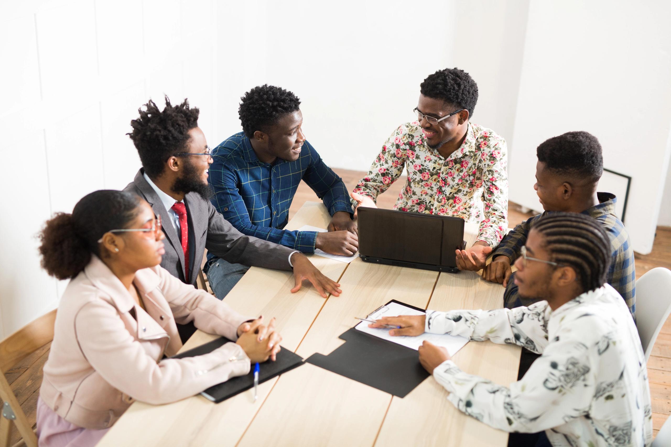 Group of students around a table