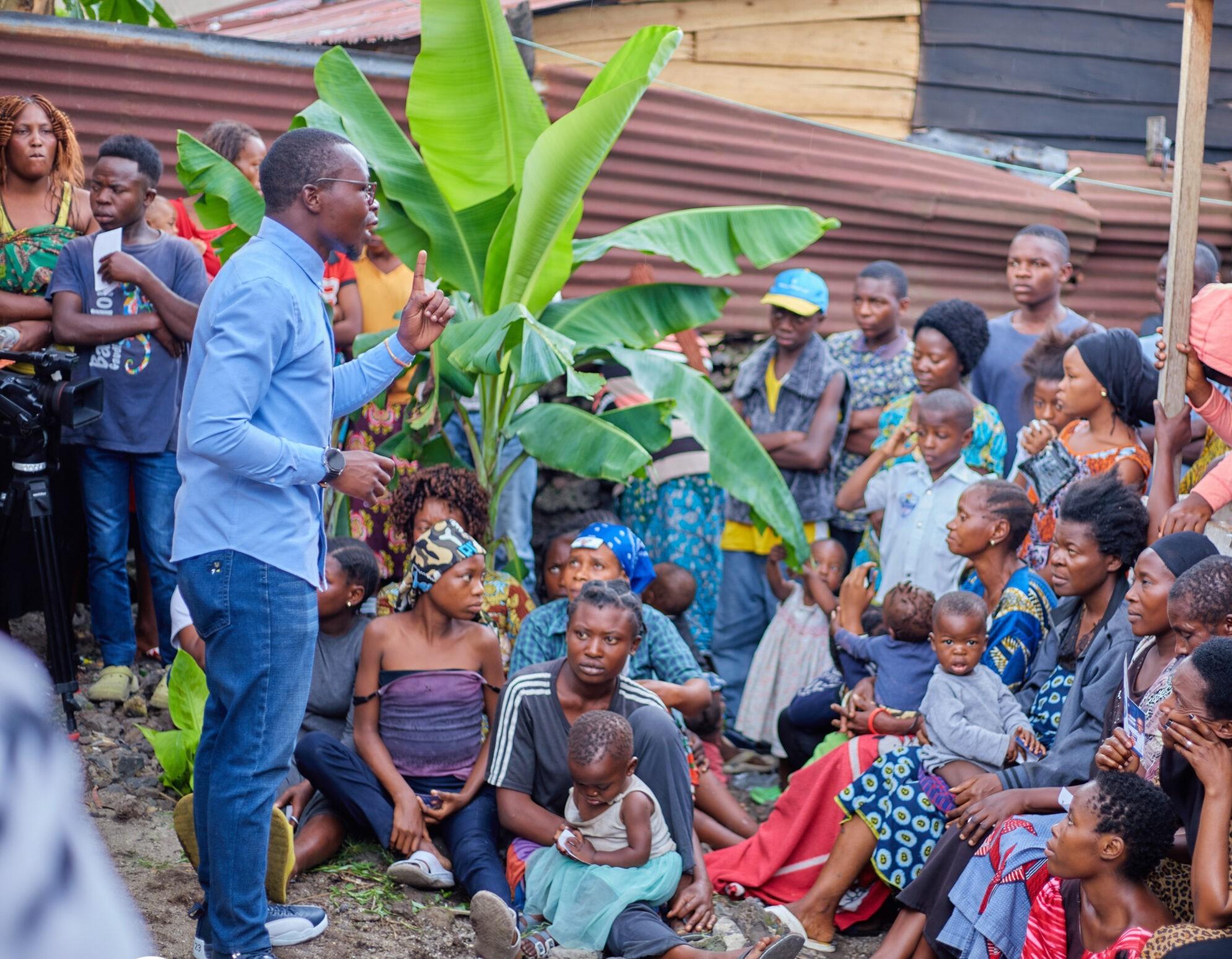 Espoir talking to a group